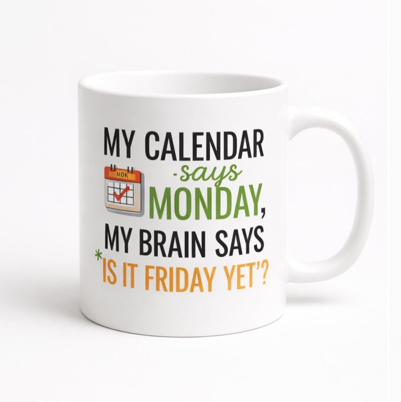 rn image picker lib temp fa127cf0 e89d 4db2 9911 50f758b6bf4d.jpg White mug printed “My Calendar Says Monday, My Brain Says Is It Friday Yet?”